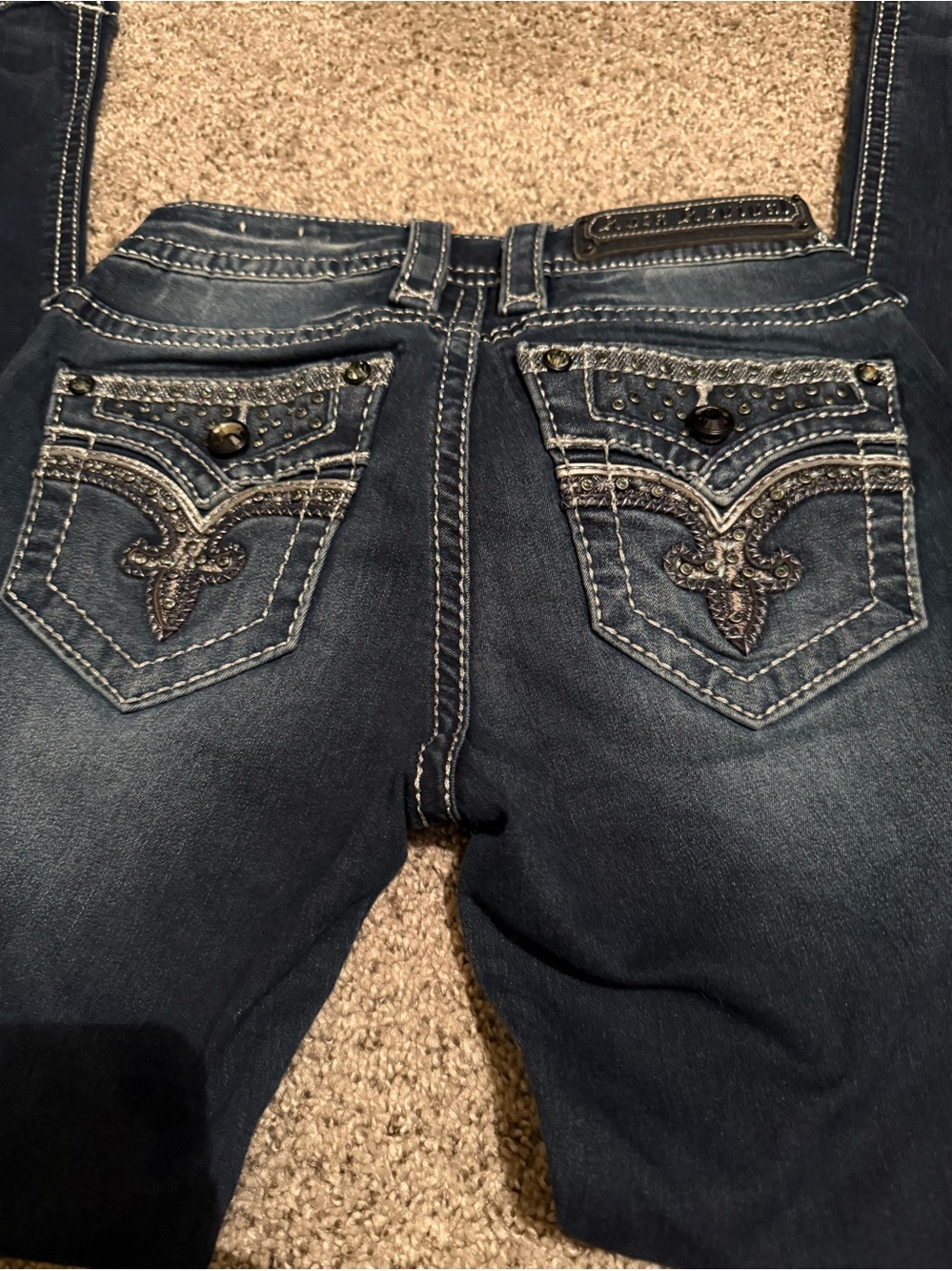 Women’s rock revival and miss me skinny jeans
